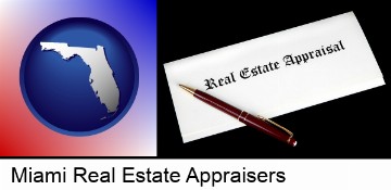 real estate appraisal documents and a pen in Miami, FL